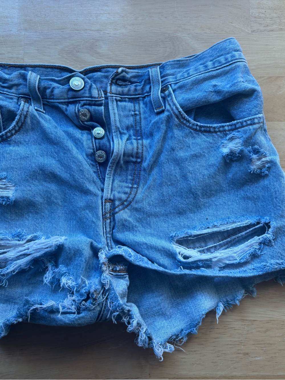 Levi's Distressed Light Blue Denim Cutoff Shorts